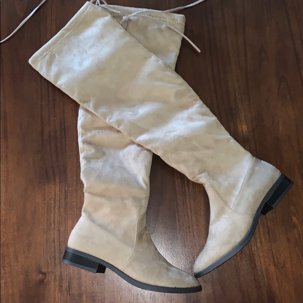 Light brown knee high boots